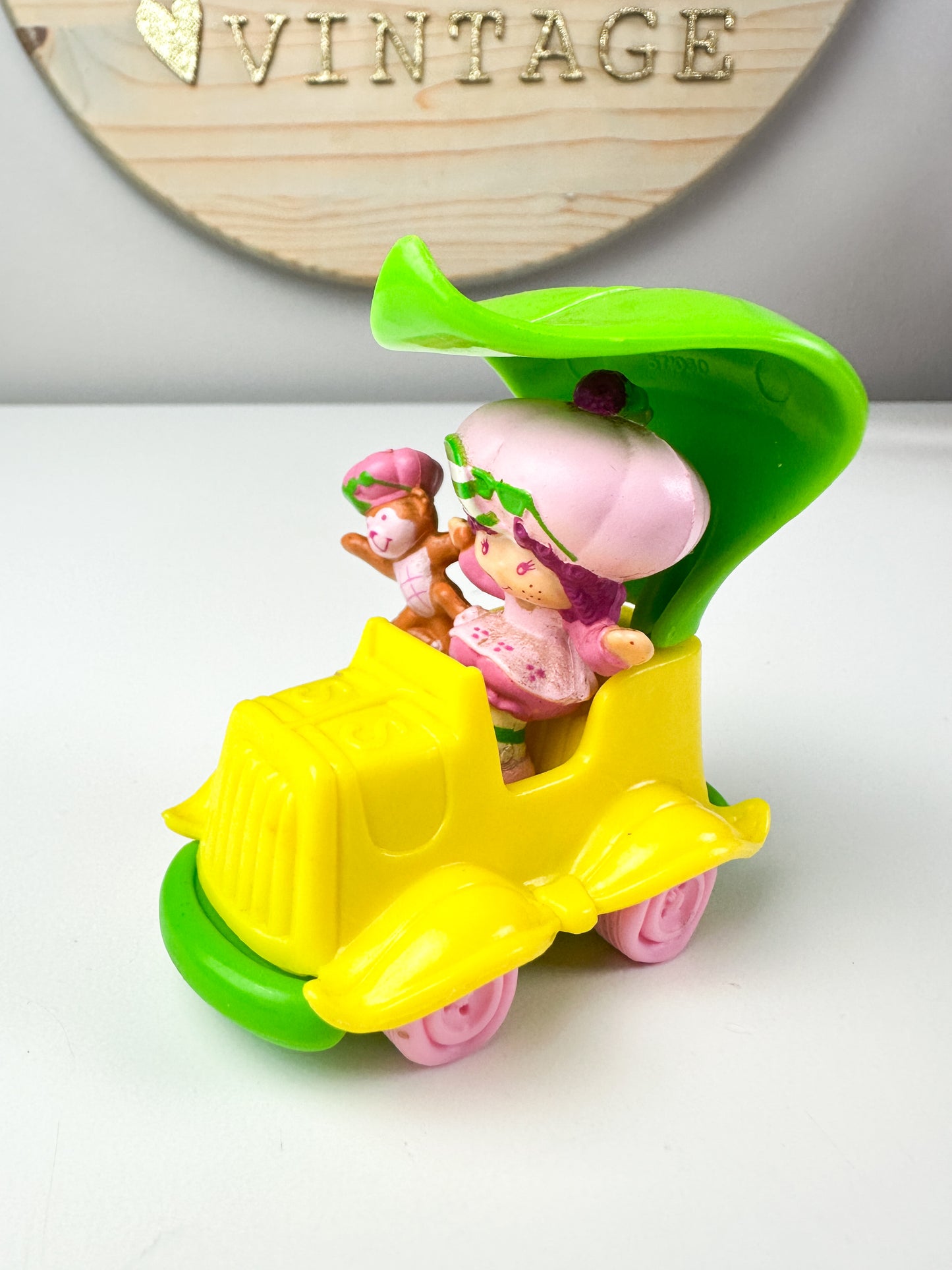 1983 Kenner Strawberry Shortcake Deluxe Miniature Strawberry Shortcake Raspberry Tart with Rhubarb Riding in a Car