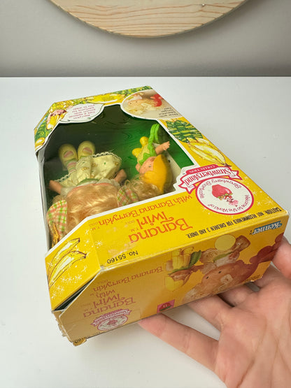 1985 Kenner Strawberry Shortcake Banana Twirl with Banana Berrykin Doll MIB *Berry Vault*